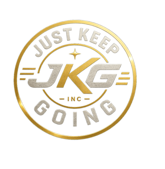 Just Keep Going Inc badge — gold ring, JKG monogram